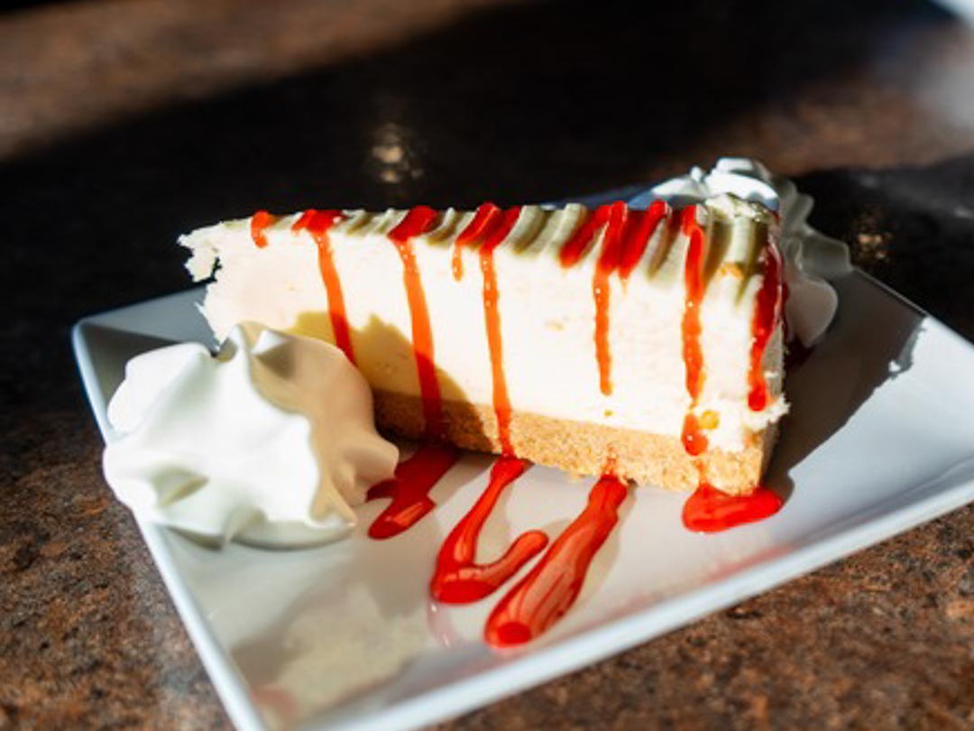 Blondie's Best Cheesecake Ever New York Style with Strawberry Sauce Glaze